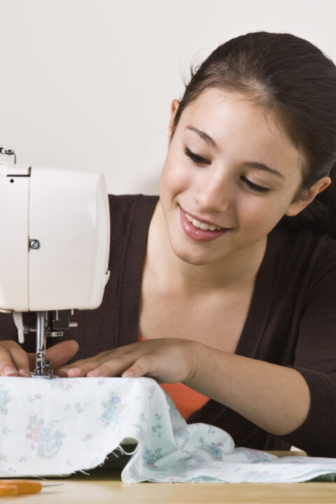 Beautiful Girl Sewing